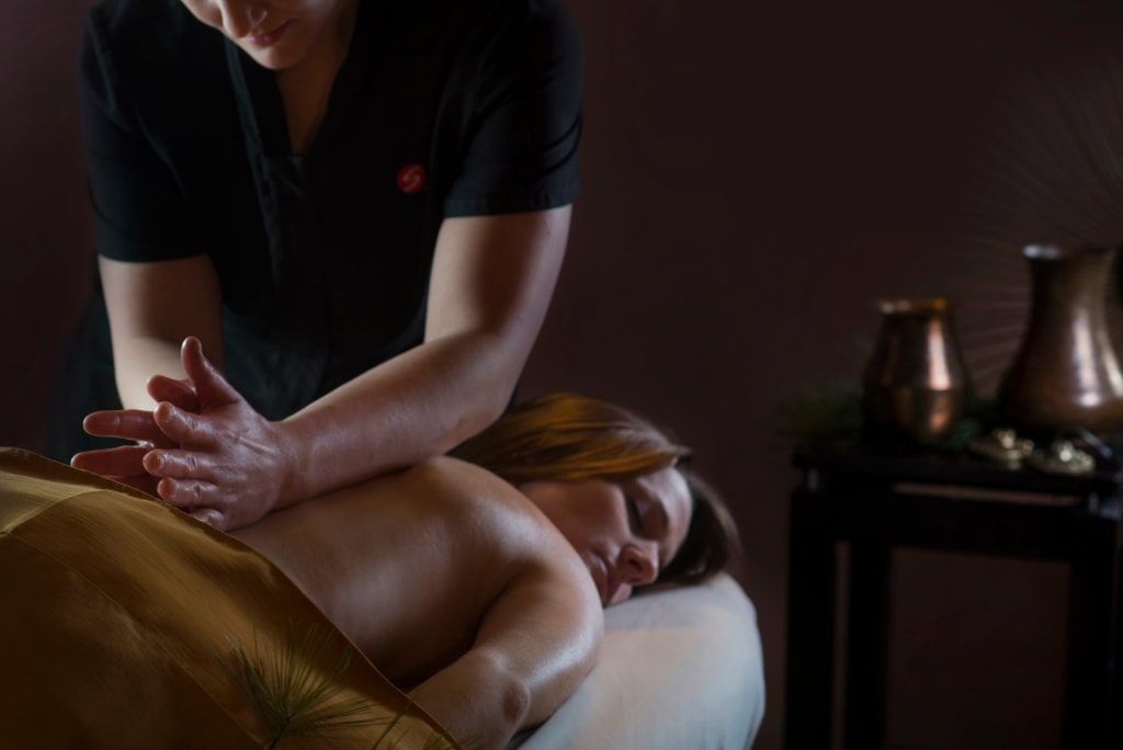 Wellness Retreats & Spa Resorts in Wisconsin Sundara woman getting spa treatment